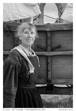 Woman dressed as pionneer. Fort Laramie National Historical Site, Wyoming, USA (black and white)
