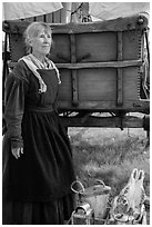 Woman with Pionneer wagon. Fort Laramie National Historical Site, Wyoming, USA ( black and white)