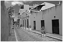 Cobblestone street and colorful houses, old town. San Juan, Puerto Rico (black and white)