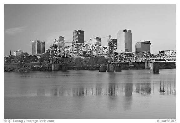 Skyline and bridge with reflections in river at sunrise. Little Rock, Arkansas, USA (black and white)