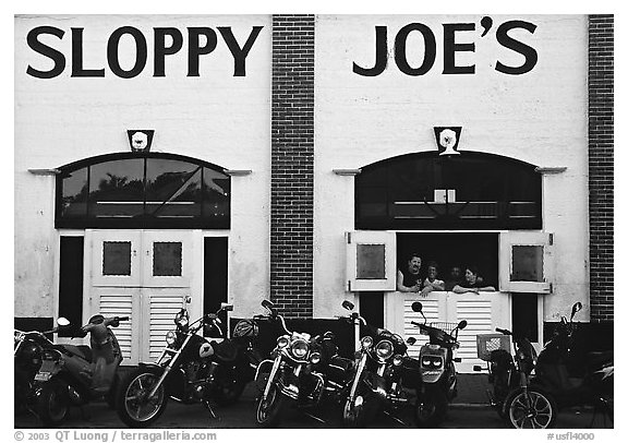 Motorbikes in front of Sloppy Joe. Key West, Florida, USA (black and white)