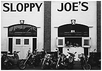 Motorbikes in front of Sloppy Joe. Key West, Florida, USA ( black and white)