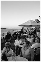 Crowds celebrating sunset at Mallory Square. Key West, Florida, USA ( black and white)