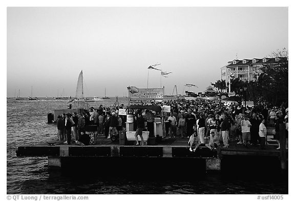 Crowds watching sunset at Mallory Square. Key West, Florida, USA (black and white)