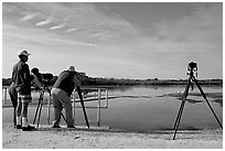 Photographers with big lenses, Ding Darling NWR, Sanibel Island. Florida, USA ( black and white)