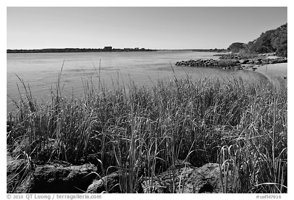 Matanzas River, and fort in the distance, Fort Matanzas National Monument. St Augustine, Florida, USA (black and white)