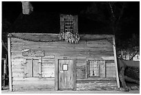 Facade of oldest wooden school house in the US by night. St Augustine, Florida, USA (black and white)