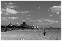People strolling on South Beach, Miami Beach. Florida, USA ( black and white)