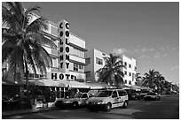 Taxi cabs and row of hotels in art deco architecture, Miami Beach. Florida, USA ( black and white)
