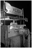 Food stall selling conch fritters on Mallory Square. Key West, Florida, USA ( black and white)