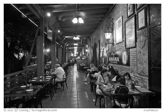 Outdoor dining at Cuban restaurant, Mallory Square. Key West, Florida, USA (black and white)