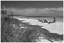 Beachgoers, Sandspur Beach, Bahia Honda State Park. The Keys, Florida, USA ( black and white)