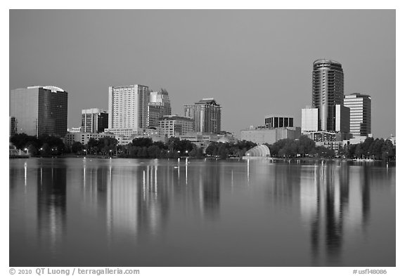Skyline at dawn from lake Eola. Orlando, Florida, USA (black and white)