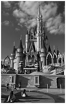 Girls in front of Cindarella castle, Walt Disney World. Orlando, Florida, USA (black and white)