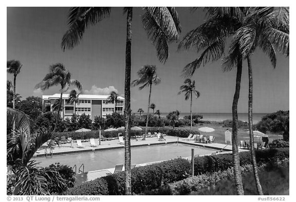 Beachside resort seen through screen, Sanibel Island. Florida, USA (black and white)