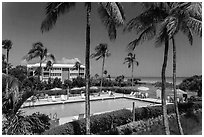 Beachside resort seen through screen, Sanibel Island. Florida, USA (black and white)