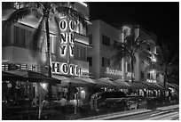 Art Deco hotels colorfully illuminated and traffic light trails, South Beach, Miami Beach. Florida, USA ( black and white)