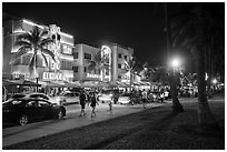 Street with row of Art Deco hotels at night, South Beach District, Miami Beach. Florida, USA ( black and white)