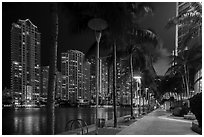 Miami Riverwalk and Miami River, Brickell district, night, Miami. Florida, USA ( black and white)