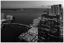 Biscayne Bay, Brickell Key Bridge, and Key Biscayne at dusk, Miami. Florida, USA ( black and white)