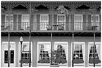 Balcony with wrought-iron decor, Marshall House, Savannah oldest hotel. Savannah, Georgia, USA (black and white)