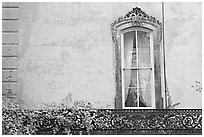 Window and wall, historical district. Savannah, Georgia, USA (black and white)