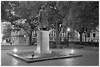 Square with statue of John Wesley at dusk. Savannah, Georgia, USA (black and white)