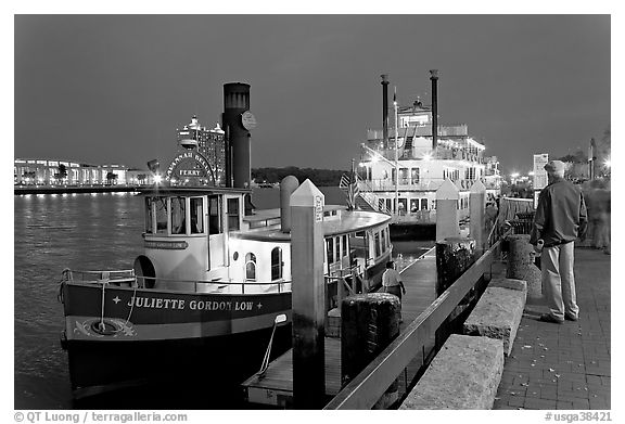 Ferry and riverboat on Savannah River at dusk. Savannah, Georgia, USA