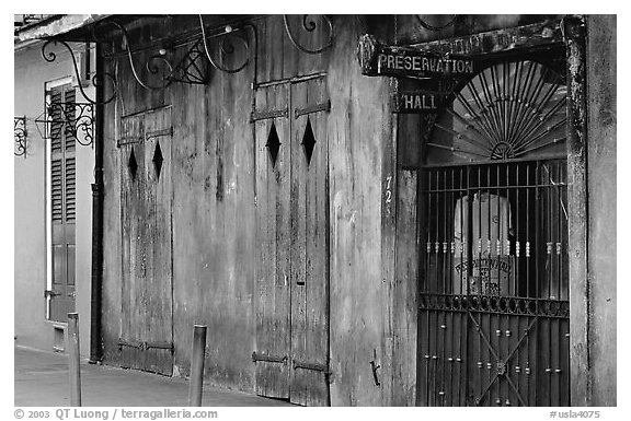 The worned out facade of the Preservation Hall, where some of the best classical jazz can be heard, French Quarter. New Orleans, Louisiana, USA (black and white)