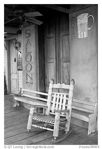 Rocking chair on saloon porch, Natchez under-the-hill. Natchez, Mississippi, USA (black and white)