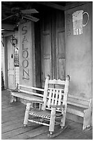 Rocking chair on saloon porch, Natchez under-the-hill. Natchez, Mississippi, USA ( black and white)