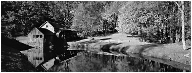 Mill and pond in autumn. Virginia, USA (Panoramic black and white)