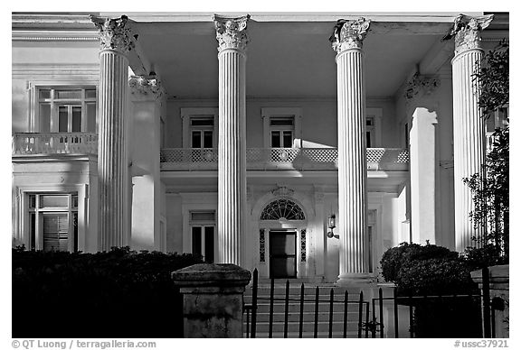 Greek revival facade with weathered  pilars. Charleston, South Carolina, USA (black and white)