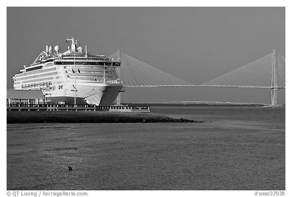 Cruise ship and suspension bridge of Cooper River. Charleston, South Carolina, USA (black and white)