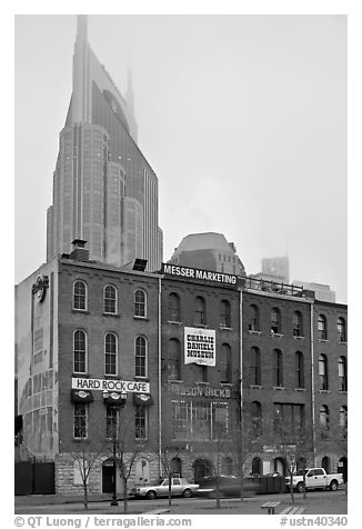 Row of brick buildings and Bell South Tower in fog. Nashville, Tennessee, USA (black and white)