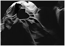 Sandstone walls sculpted by fast moving water, Upper Antelope Canyon. Arizona, USA (black and white)