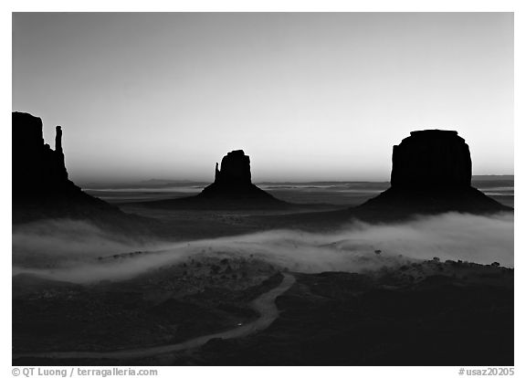 Mittens and fog, sunrise. Monument Valley Tribal Park, Navajo Nation, Arizona and Utah, USA (black and white)