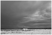 Trailer and storm sky. Arizona, USA ( black and white)