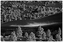Steam rising from cinder landscape, Sunset Crater Volcano National Monument. Arizona, USA ( black and white)