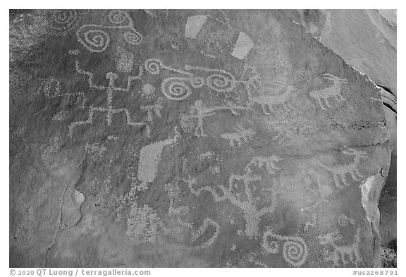 Archaic and Ancestral Puebloan petroglyphs. Vermilion Cliffs National Monument, Arizona, USA (black and white)