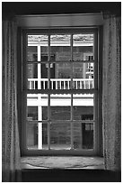 Looking out a window of Winsor Castle into the courtyard. Pipe Spring National Monument, Arizona, USA ( black and white)