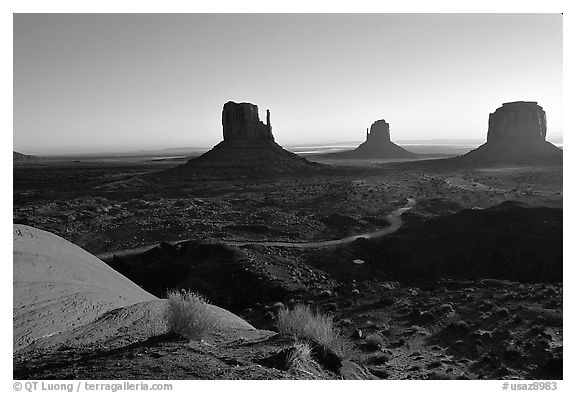 Mittens, sunrise. Monument Valley Tribal Park, Navajo Nation, Arizona and Utah, USA (black and white)