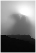 Butte in fog. Monument Valley Tribal Park, Navajo Nation, Arizona and Utah, USA ( black and white)
