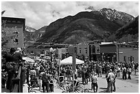 Crowds gather on main street during ice-cream social. Telluride, Colorado, USA ( black and white)