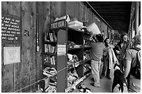 Items being exchanged at the free box. Telluride, Colorado, USA (black and white)