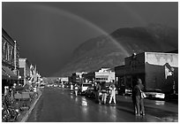 Double rainbow and dark sky over main street. Telluride, Colorado, USA ( black and white)