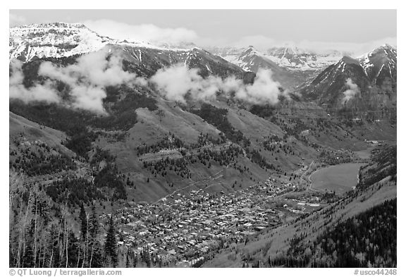 Box canyon surrounded by snowy mountains in spring. Telluride, Colorado, USA (black and white)
