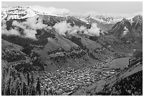 Box canyon surrounded by snowy mountains in spring. Telluride, Colorado, USA ( black and white)