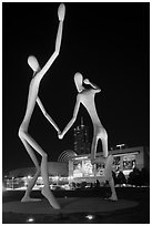 Sculpture framing Center for Performing Arts at night. Denver, Colorado, USA ( black and white)