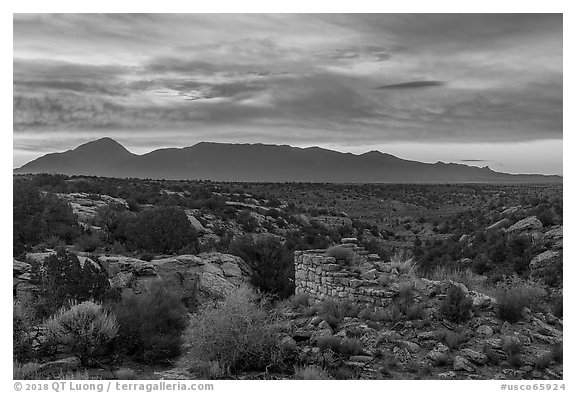 Pueblo and Sleeping Ute Mountain, sunrise. Hovenweep National Monument, Colorado, USA (black and white)